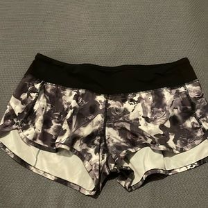 Lululemon black and gray floral print workout shorts, size 6